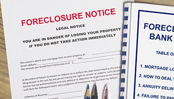 Immage of a sheet of paper with the words Foreclosure Notice.